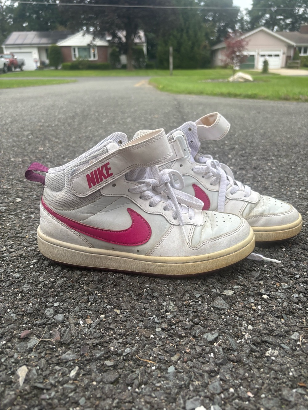 Nike Women's White High-Top Sneakers with Pink Swoosh